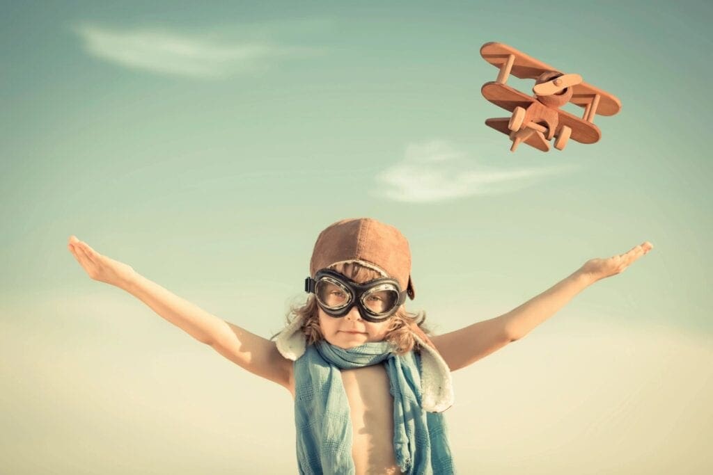 Child with Airplane Toy